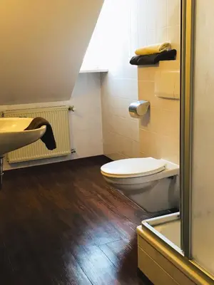 Ein Badezimmer in der Unterkunft Landgasthof Ostermair
