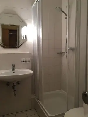 Ein Badezimmer in der Unterkunft Landgasthof Ostermair
