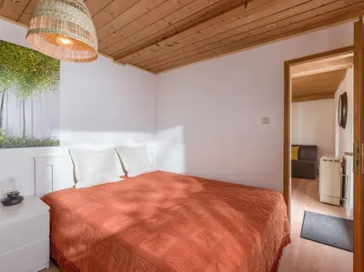 Ein Bett oder Betten in einem Zimmer der Unterkunft Grabner Riedleiten Bienenhaus
