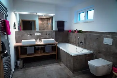 Ein Badezimmer in der Unterkunft Das Luegstein