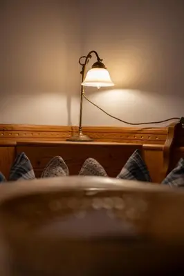 Ein Bett oder Betten in einem Zimmer der Unterkunft Adlerhof