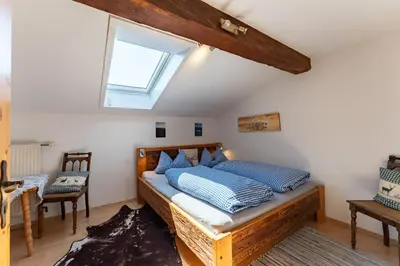 Ein Bett oder Betten in einem Zimmer der Unterkunft Adlerhof