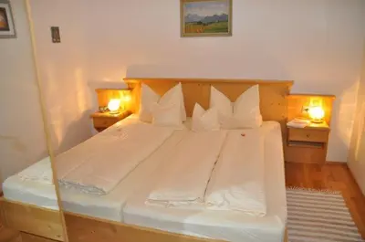 Ein Bett oder Betten in einem Zimmer der Unterkunft Taffenreutherhof