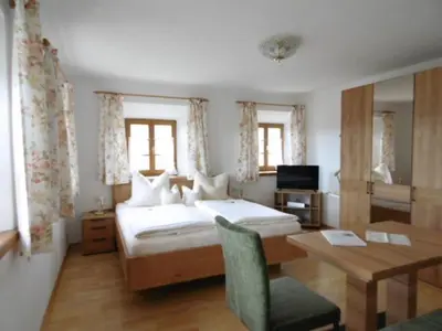 Ein Bett oder Betten in einem Zimmer der Unterkunft Taffenreutherhof