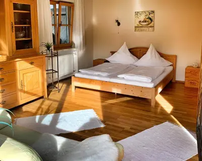 Ein Bett oder Betten in einem Zimmer der Unterkunft Ferienwohnung Kathi