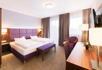 Ein Bett oder Betten in einem Zimmer der Unterkunft Hotel Seeblick