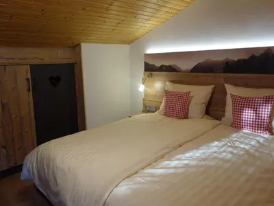 Ein Bett oder Betten in einem Zimmer der Unterkunft Doblerhof