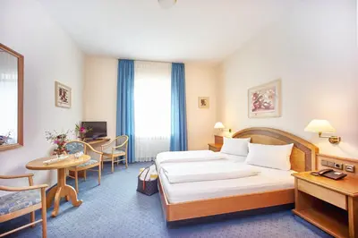 Ein Bett oder Betten in einem Zimmer der Unterkunft Hotel Klosterhotel Ludwig der Bayer