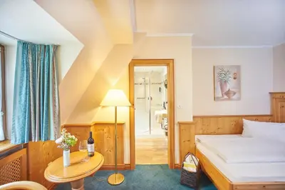 Ein Bett oder Betten in einem Zimmer der Unterkunft Hotel Klosterhotel Ludwig der Bayer