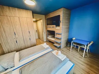 Ein Bett oder Betten in einem Zimmer der Unterkunft Jugendherberge München City