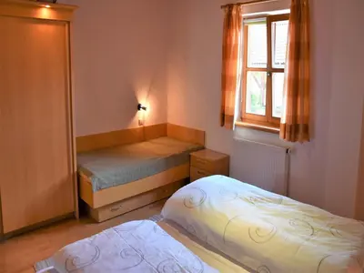 Ein Bett oder Betten in einem Zimmer der Unterkunft Ferienhof Schauer