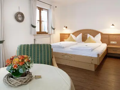 Ein Bett oder Betten in einem Zimmer der Unterkunft Gästehaus Bernhard