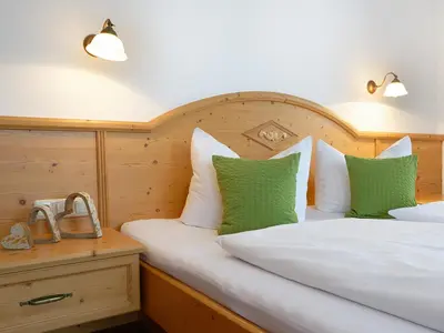 Ein Bett oder Betten in einem Zimmer der Unterkunft Gästehaus Bernhard