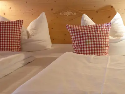 Ein Bett oder Betten in einem Zimmer der Unterkunft Gästehaus Bernhard