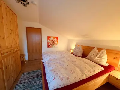Ein Bett oder Betten in einem Zimmer der Unterkunft Ferienwohnung Christa