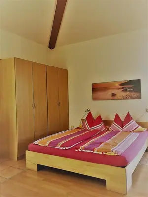 Ein Bett oder Betten in einem Zimmer der Unterkunft Appartement Joli