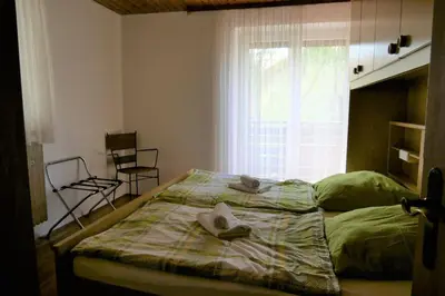 Ein Bett oder Betten in einem Zimmer der Unterkunft Ferienwohnung Chiemsee