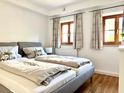 Ein Bett oder Betten in einem Zimmer der Unterkunft Landhof Angstl - Gästezimmer und Tagungsraum