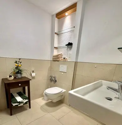 Ein Badezimmer in der Unterkunft Landhof Angstl - Gästezimmer und Tagungsraum