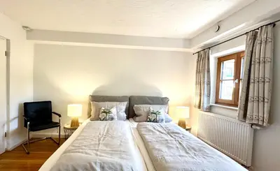 Ein Bett oder Betten in einem Zimmer der Unterkunft Landhof Angstl - Gästezimmer und Tagungsraum