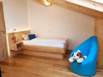 Ein Bett oder Betten in einem Zimmer der Unterkunft Rinser See-Hof