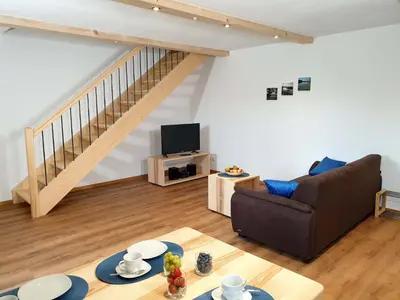 Ein Sitzbereich in der Unterkunft Rinser See-Hof