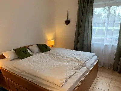 Ein Bett oder Betten in einem Zimmer der Unterkunft Ferienwohnung Theresa