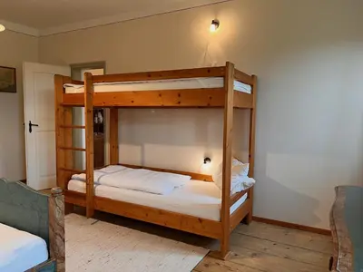 Ein Bett oder Betten in einem Zimmer der Unterkunft Sprenghof