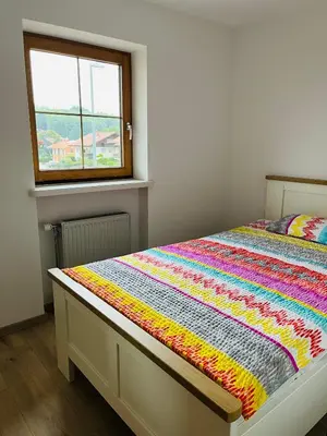 Ein Bett oder Betten in einem Zimmer der Unterkunft Haus Oberland