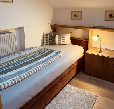Ein Bett oder Betten in einem Zimmer der Unterkunft Haus Oberland