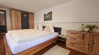 Ein Bett oder Betten in einem Zimmer der Unterkunft Heissenhof Urlaub auf dem Bauernhof