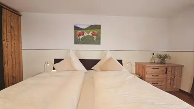 Ein Bett oder Betten in einem Zimmer der Unterkunft Heissenhof Urlaub auf dem Bauernhof