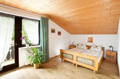Ein Bett oder Betten in einem Zimmer der Unterkunft Ferienwohnung Daiber