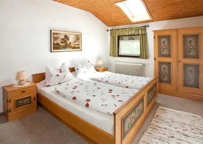 Ein Bett oder Betten in einem Zimmer der Unterkunft Ferienwohnung Daiber