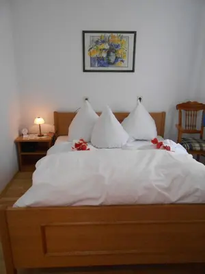 Ein Bett oder Betten in einem Zimmer der Unterkunft Farchanter Alm