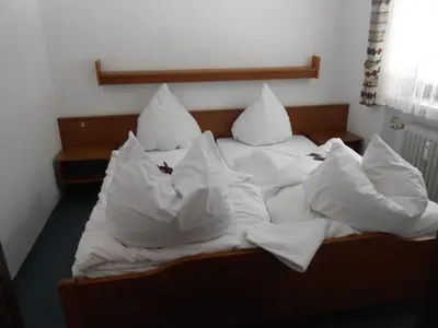 Ein Bett oder Betten in einem Zimmer der Unterkunft Farchanter Alm