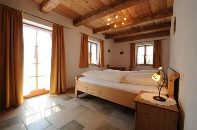 Ein Bett oder Betten in einem Zimmer der Unterkunft Stöttnerhof Urlaub auf dem Bauernhof