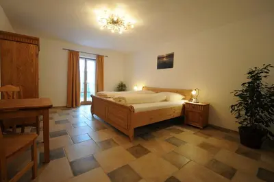 Ein Bett oder Betten in einem Zimmer der Unterkunft Stöttnerhof Urlaub auf dem Bauernhof
