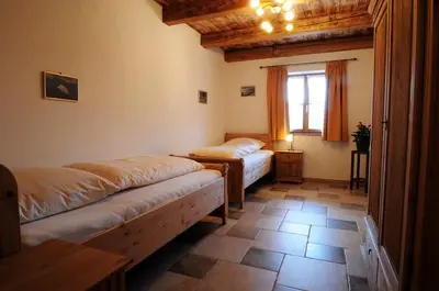 Ein Bett oder Betten in einem Zimmer der Unterkunft Stöttnerhof Urlaub auf dem Bauernhof