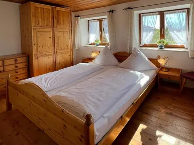 Ein Bett oder Betten in einem Zimmer der Unterkunft Ferienwohnungen Loisenhof