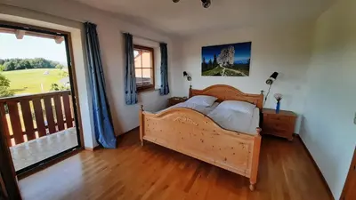 Ein Bett oder Betten in einem Zimmer der Unterkunft Ferienwohnungen Loisenhof