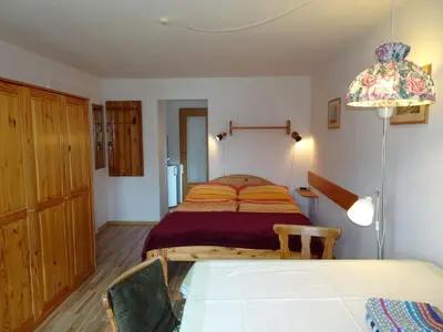 Ein Bett oder Betten in einem Zimmer der Unterkunft Gästehaus Strobl am See