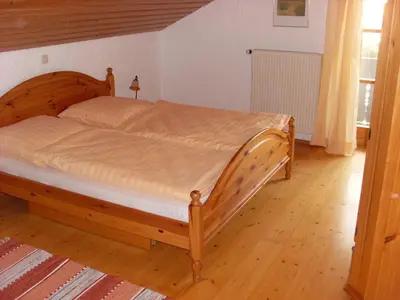 Ein Bett oder Betten in einem Zimmer der Unterkunft Ferienwohnung Schartner