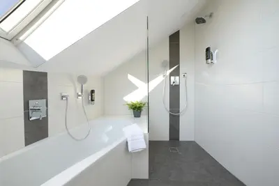 Ein Badezimmer in der Unterkunft ChiemseeLeben