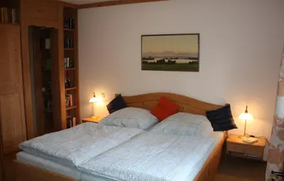 Ein Bett oder Betten in einem Zimmer der Unterkunft Ferienhaus am Chiemsee