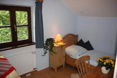 Ein Bett oder Betten in einem Zimmer der Unterkunft Ferienhaus am Chiemsee