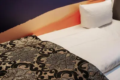 Ein Bett oder Betten in einem Zimmer der Unterkunft Helvetia Rooms - Self Check-In