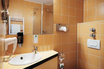 Ein Badezimmer in der Unterkunft Helvetia Rooms - Self Check-In