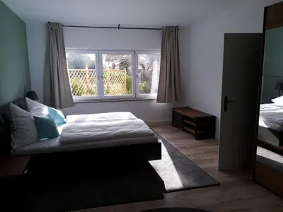 Ein Bett oder Betten in einem Zimmer der Unterkunft Ferienwohnung Zürcher
