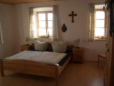 Ein Bett oder Betten in einem Zimmer der Unterkunft Irgenbauer